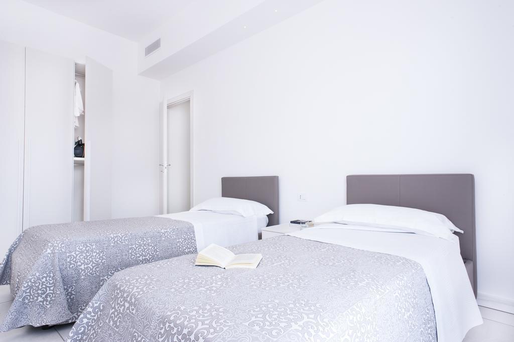 Vuelle Residence Apartments Capo dʼOrlando Δωμάτιο φωτογραφία